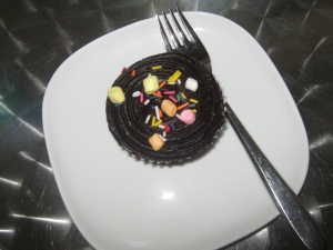 chocolate cupcake with chocolate cream topping